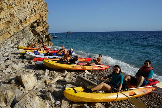 Budva Bay: Kayak & SUP Tour to Coastal Caves - Resting at water-access Calypso Beach