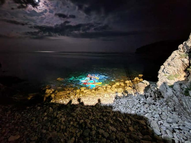 Budva: Night Lights Kayaking Tour - Budva Old Town glowing after sunset