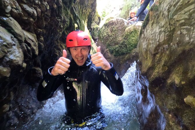 Explore the Thrills of Nevidio Canyon: 4 hour Canyoning Adventure - Rappels, jumps, and natural slides