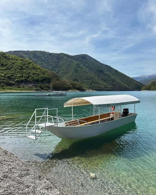 Piva Lake: Oteša Cave Cruise with Optional BBQ - Leaving Marina Plužine beneath the bridge