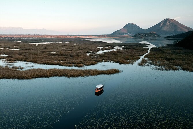 Private Skadar Lake National Park Tour with Wooden Boat and Wine - Lake Skadars lilies and wild island scenery