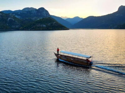 Skadar Lake: Guided Sunset Boat Tour with Wooden Boat & Wine