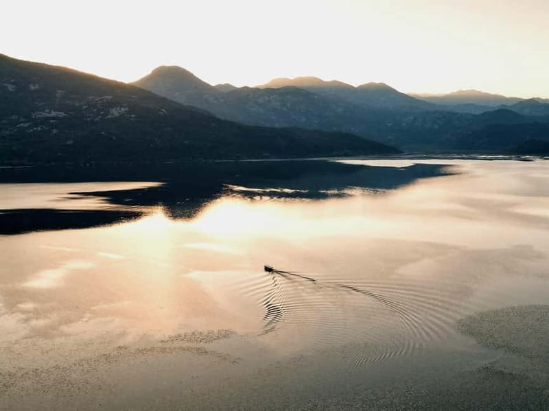 Skadar Lake: Guided Sunset Boat Tour with Wooden Boat & Wine - Lesendro Fortress and the story of Njegoš