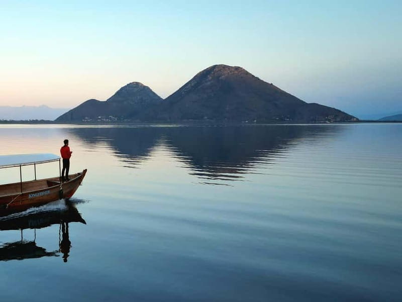 Skadar Lake: Guided Sunset Boat Tour with Wooden Boat & Wine - Kamenik is the main pause for wine and photographs